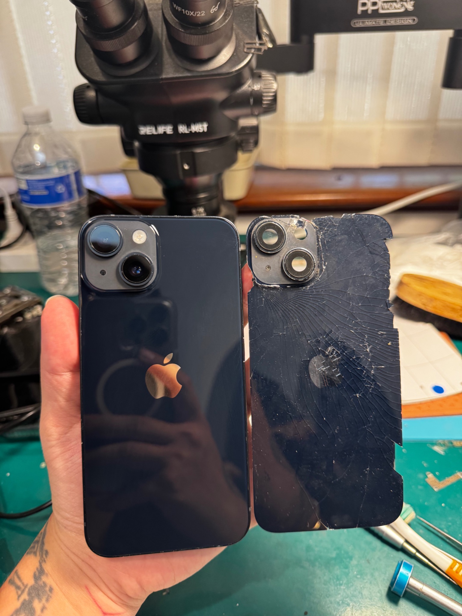 Phone back glass repair work by V Tech Express
